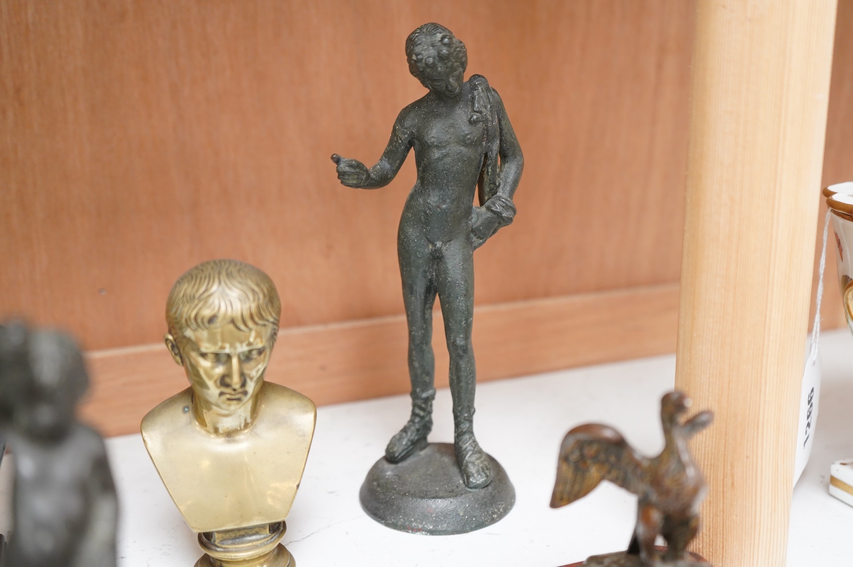 Italian grand tour souvenirs, 19th/20th century; nine small sculptures and busts, after the antique, the majority bronze and one depicting Lucius Verus, largest 19cm high